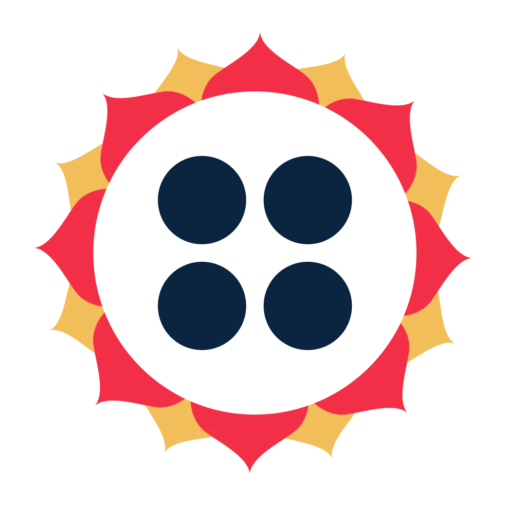 A black button with four holes, surrounded by a red and yellow floral pattern.
