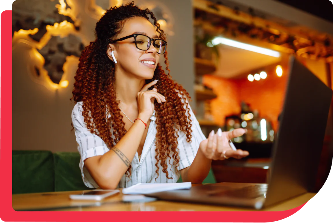 A woman practicing another language online. A woman practicing another language online.